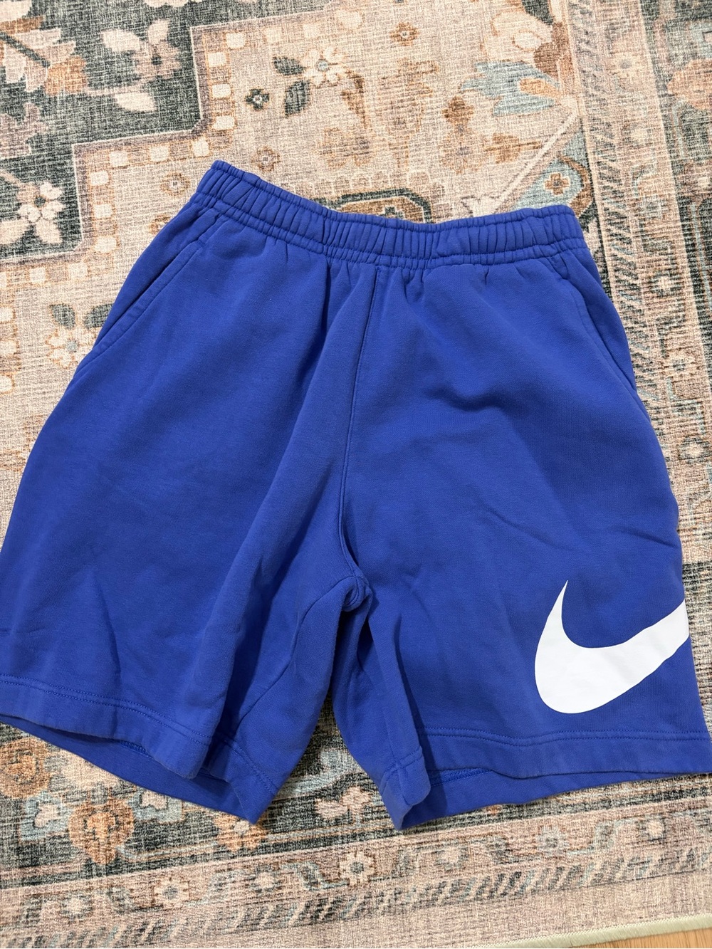 Nike Blue Athletic Shorts with White Swoosh